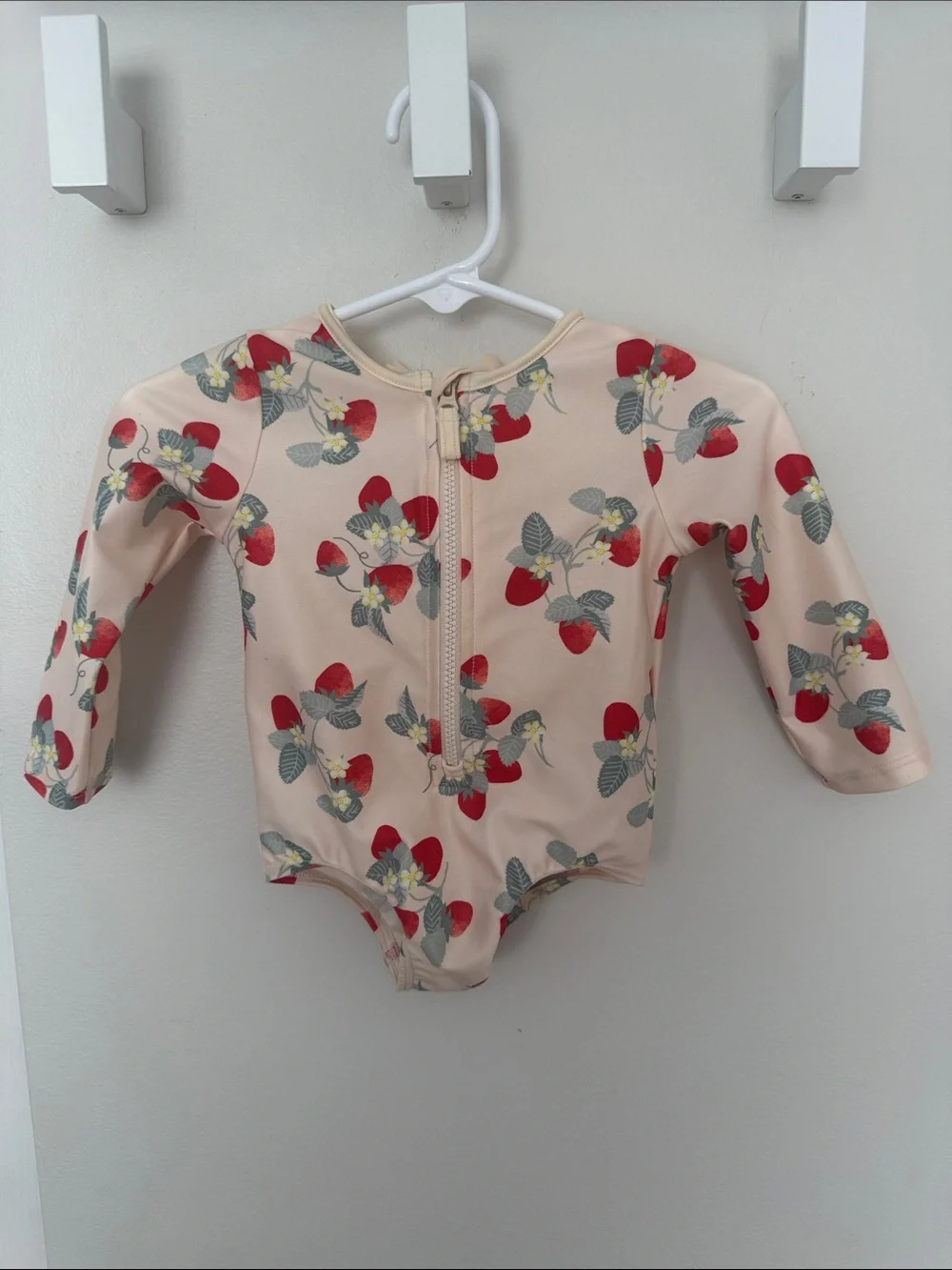 H&M Peach-Pink Long-Sleeve One-Piece with Red Strawberry Print